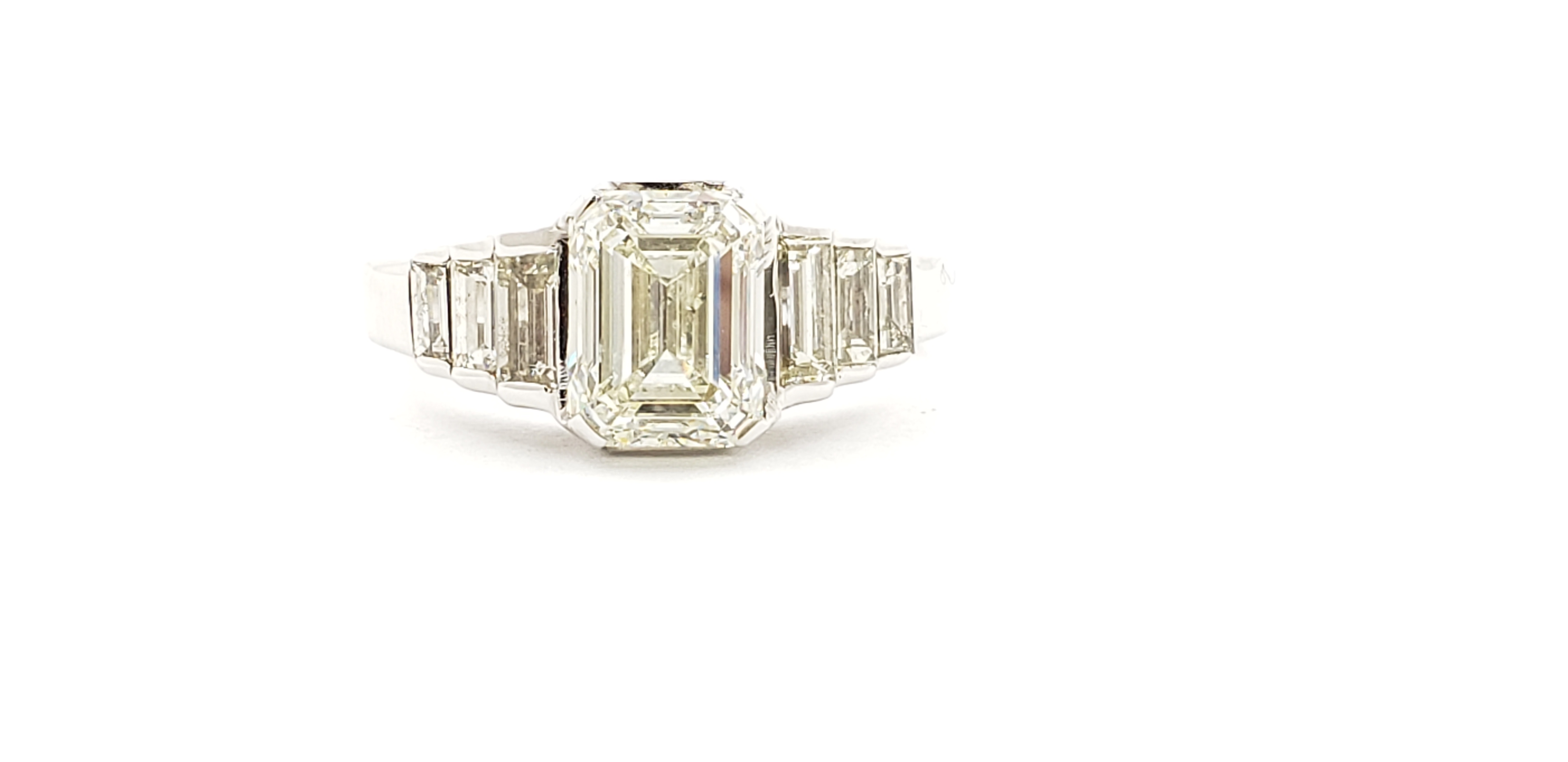 Emerald Cut Diamond Ring with Side Baguette Shape Diamonds